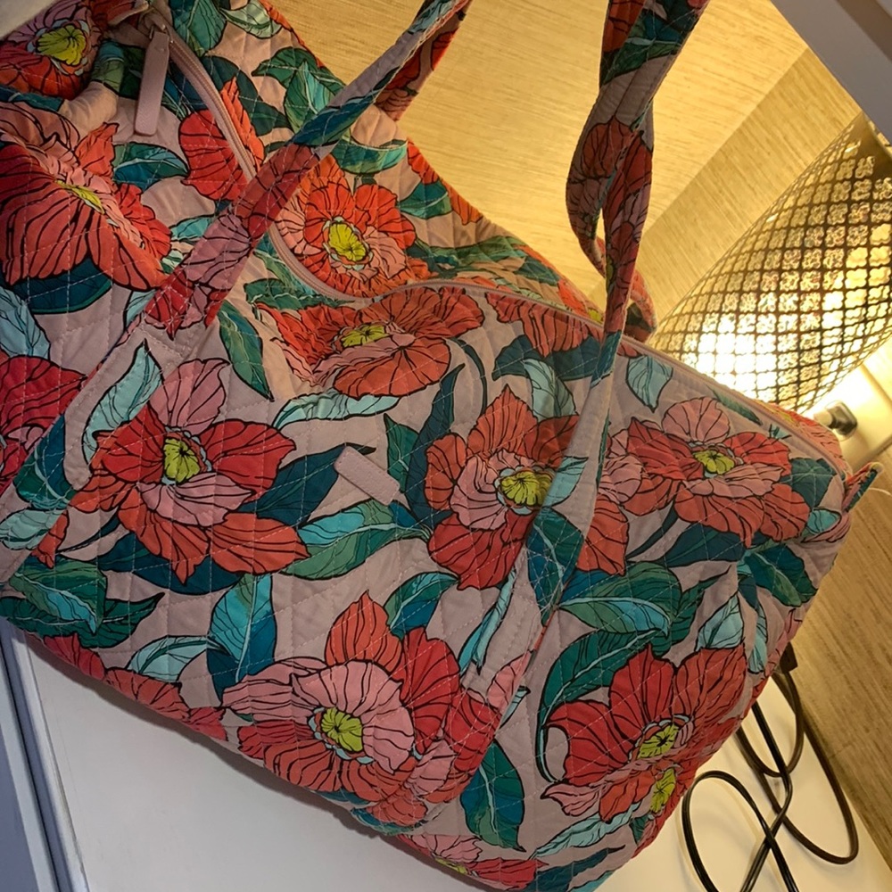 Brand new Vera Bradley duffle  with no stains- never used